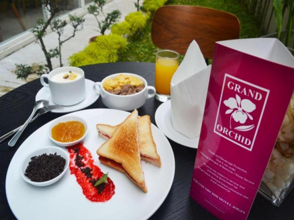 Grand Orchid Hotel Yogyakarta Maguwo Exterior photo